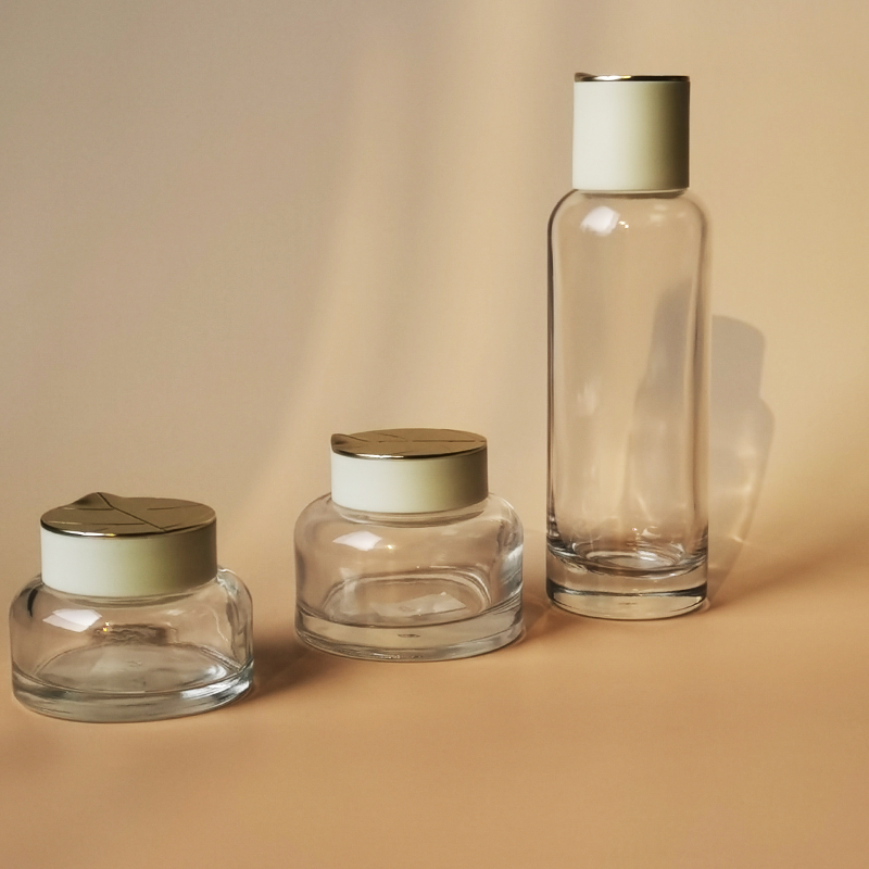 Glass Cosmetic Package Set Luxury Lotion Bottle and Cream Jar Set With Gold Tea Leaf Top Cap GS0086